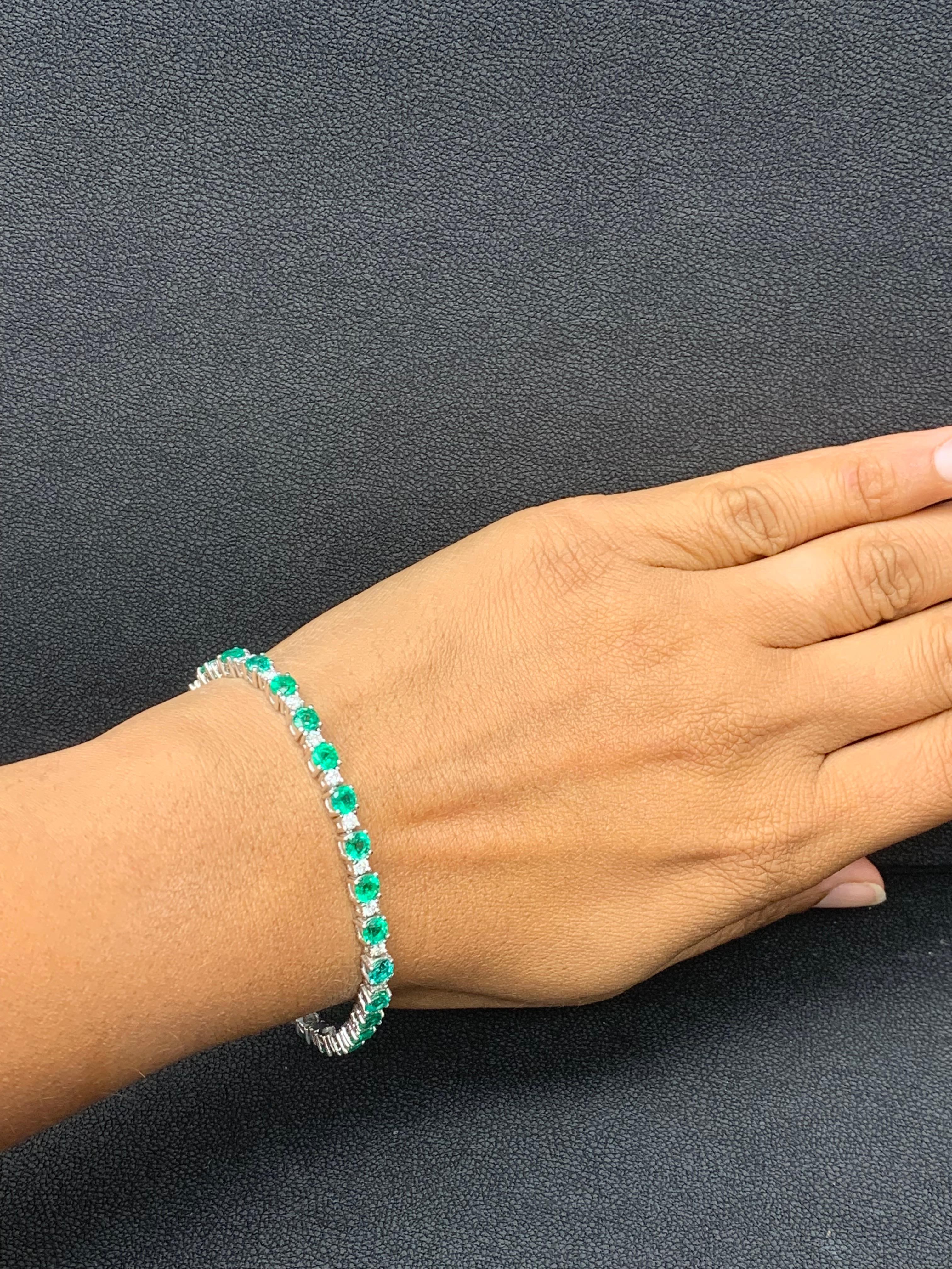 Showcasing 6.34 carats total of 27 green emeralds, elegantly alternating with 1.48 carats of 27 round brilliant diamonds. Made in 14 karat white gold.

Style available in different price ranges. Prices are based on your selection of the 4C’s (Carat,