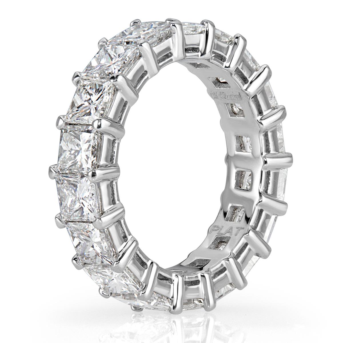 Handcrafted in high polish platinum, this gorgeous diamond eternity band showcases 6.34ct of perfectly matched princess cut diamonds. The diamonds are graded at E-F in color, VS1-VS2 in clarity. All eternity bands are shown in a size 6.5. We custom