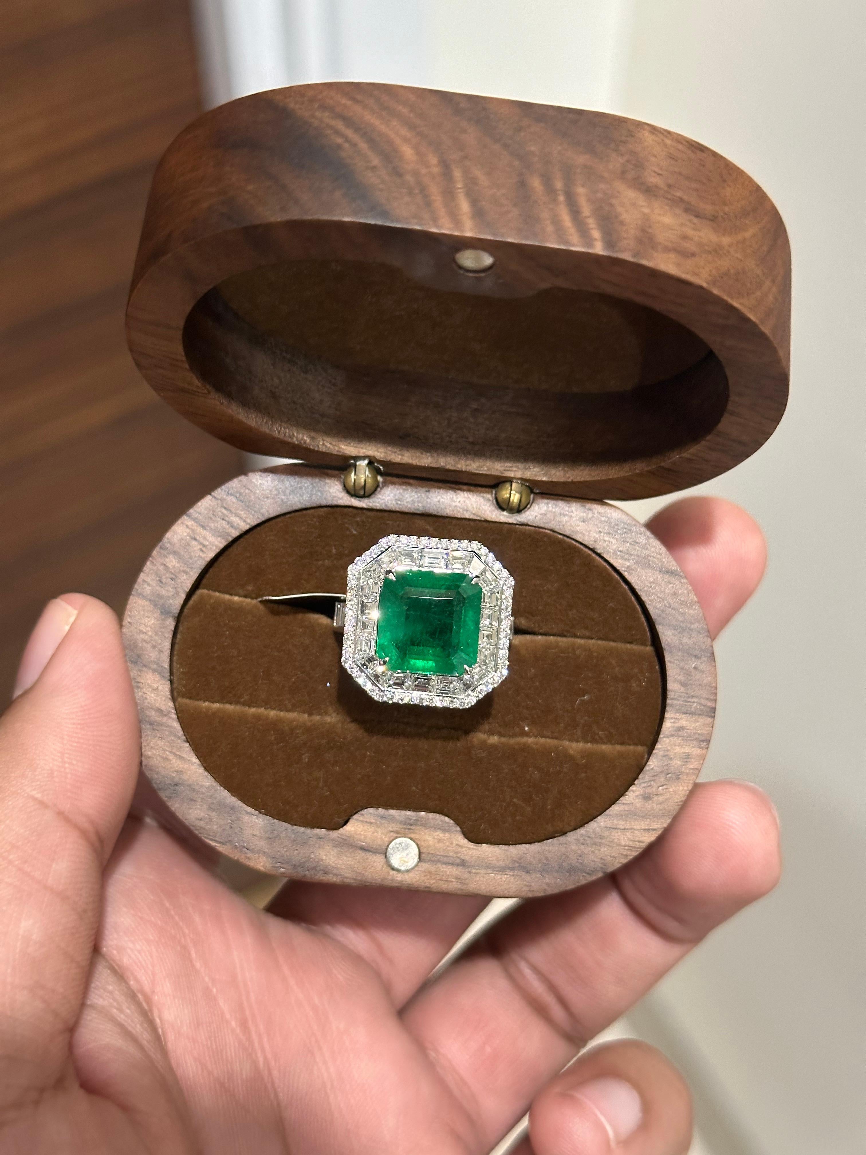 Emerald Cut 6.34 Carat Zambian Emerald Studded Classic Diamond Ring For Sale