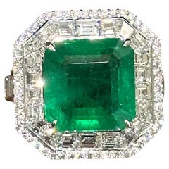6.34 Carat Zambian Emerald Studded Classic Diamond Ring