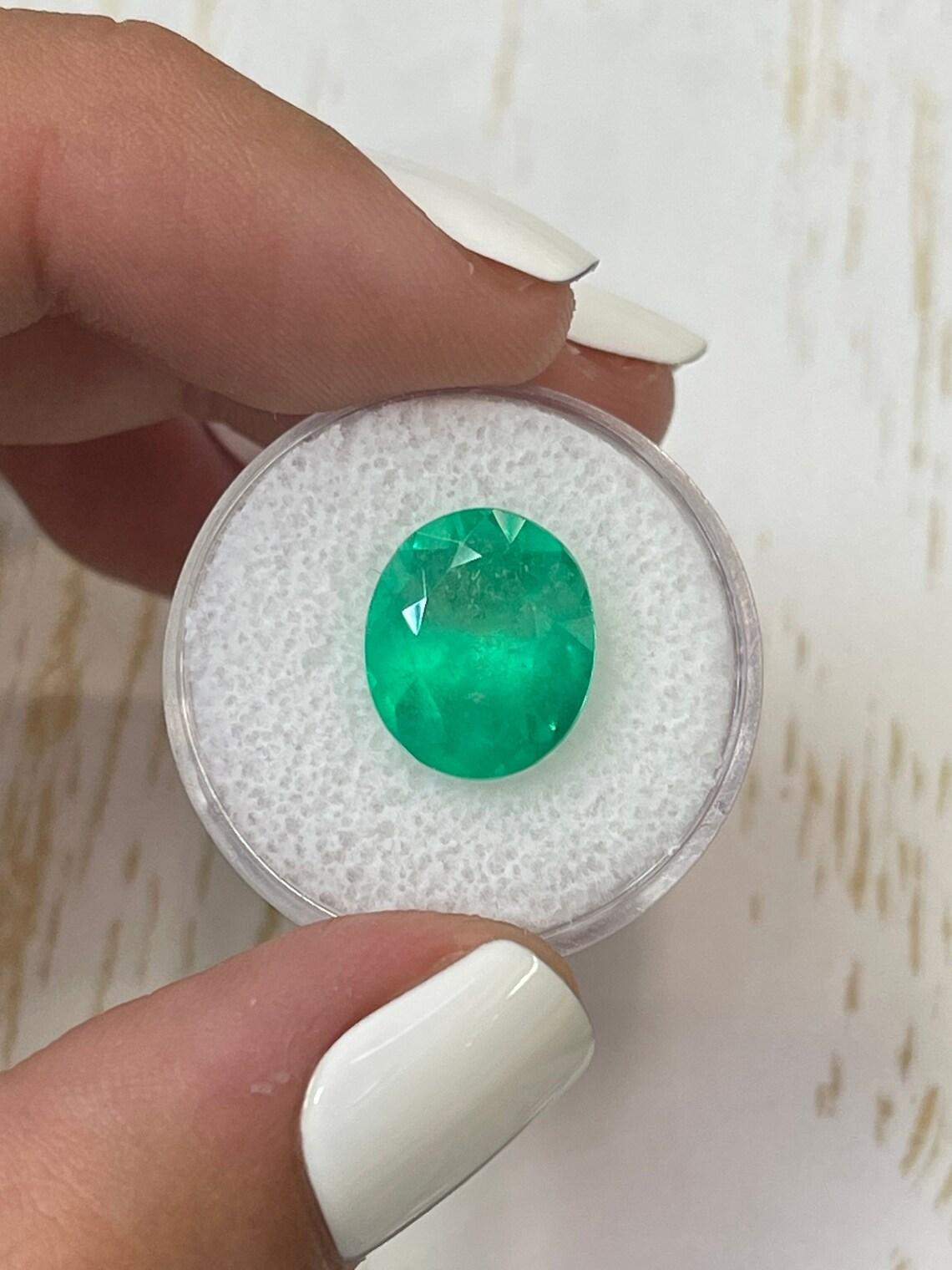 6.35 Carat 13x11 Neon Green Colombian Emerald - Oval Cut  May Birthstone Gem In New Condition For Sale In Jupiter, FL