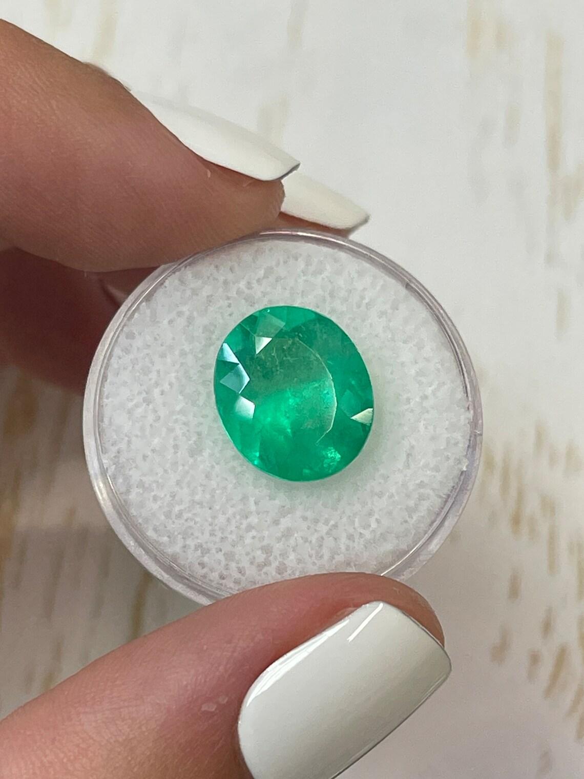 6.35 Carat 13x11 Neon Green Colombian Emerald - Oval Cut  May Birthstone Gem For Sale 1