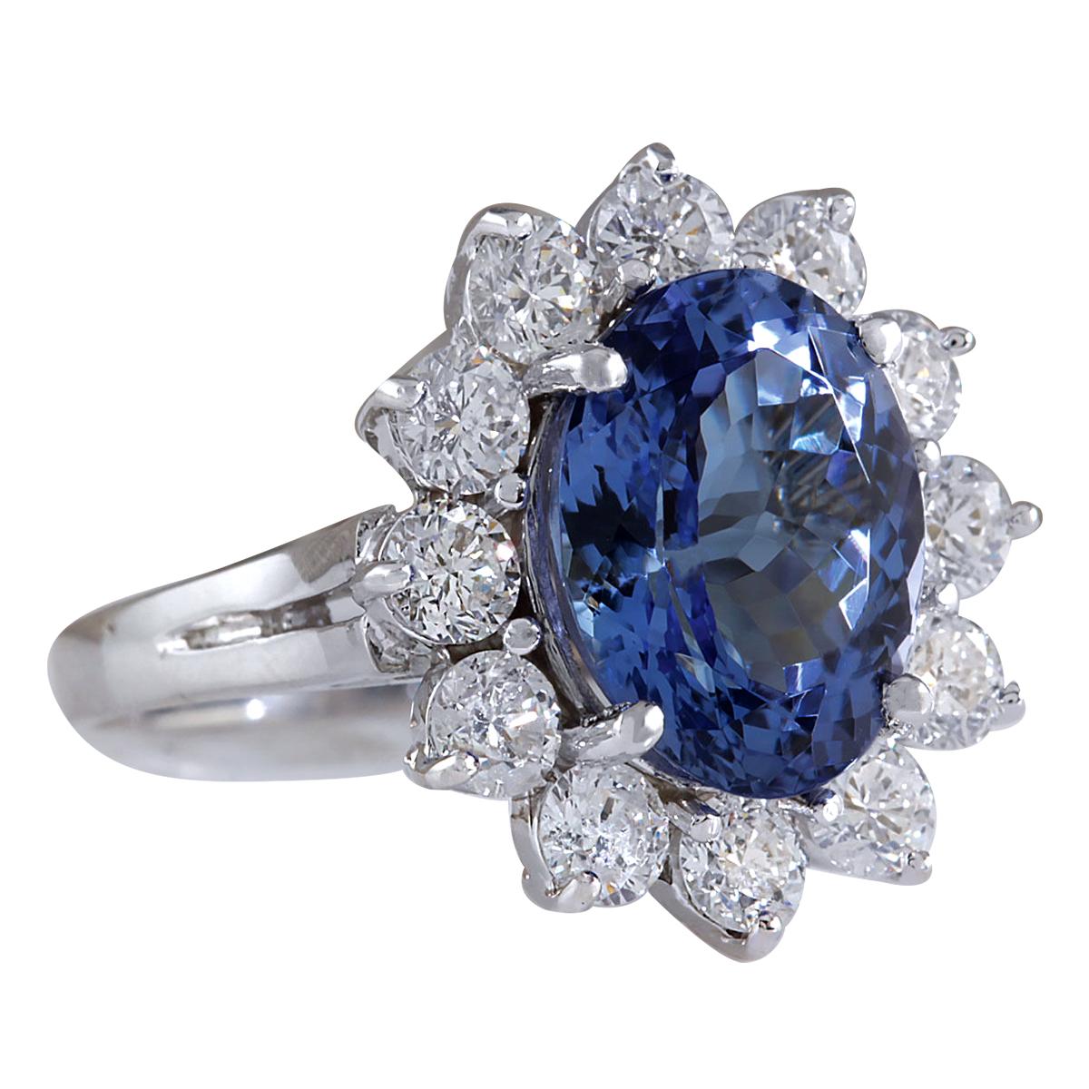 6.35 Carat Tanzanite 14 Karat White Gold Diamond Ring
Stamped: 14K White Gold
Total Ring Weight: 5.0 Grams
Total  Tanzanite Weight is 4.74 Carat (Measures: 12.00x10.00 mm)
Color: Blue
Total  Diamond Weight is 1.61 Carat
Color: F-G, Clarity: