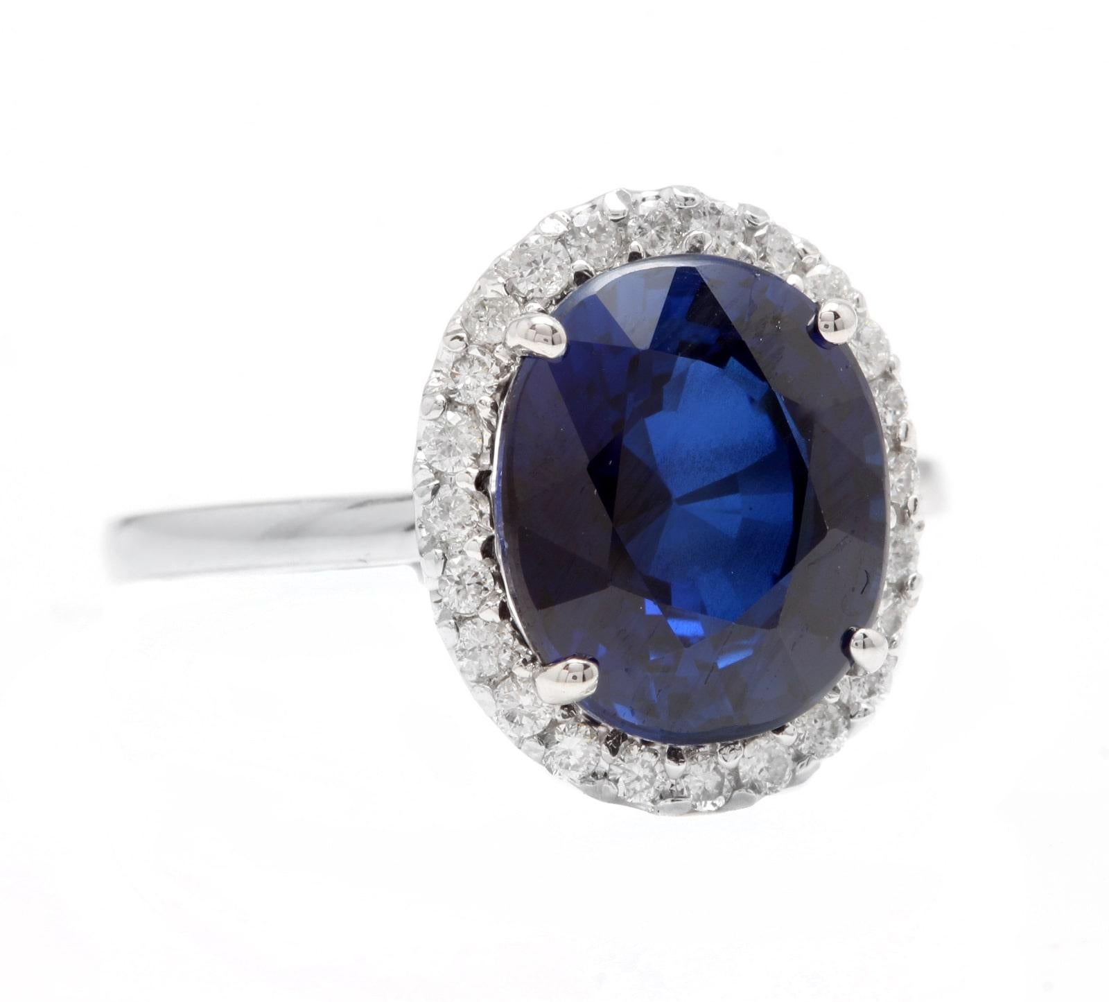 6.35 Carats Lab Ceylon Blue Sapphire and Natural Diamond 14K Solid White Gold Ring

Suggested Replacement Value $4,000.00

Metal: 14K Solid White Gold (Stamped)

Total Lab Created Blue Sapphire Weight is: Approx. 6.00 Carats 

Sapphire Measures: