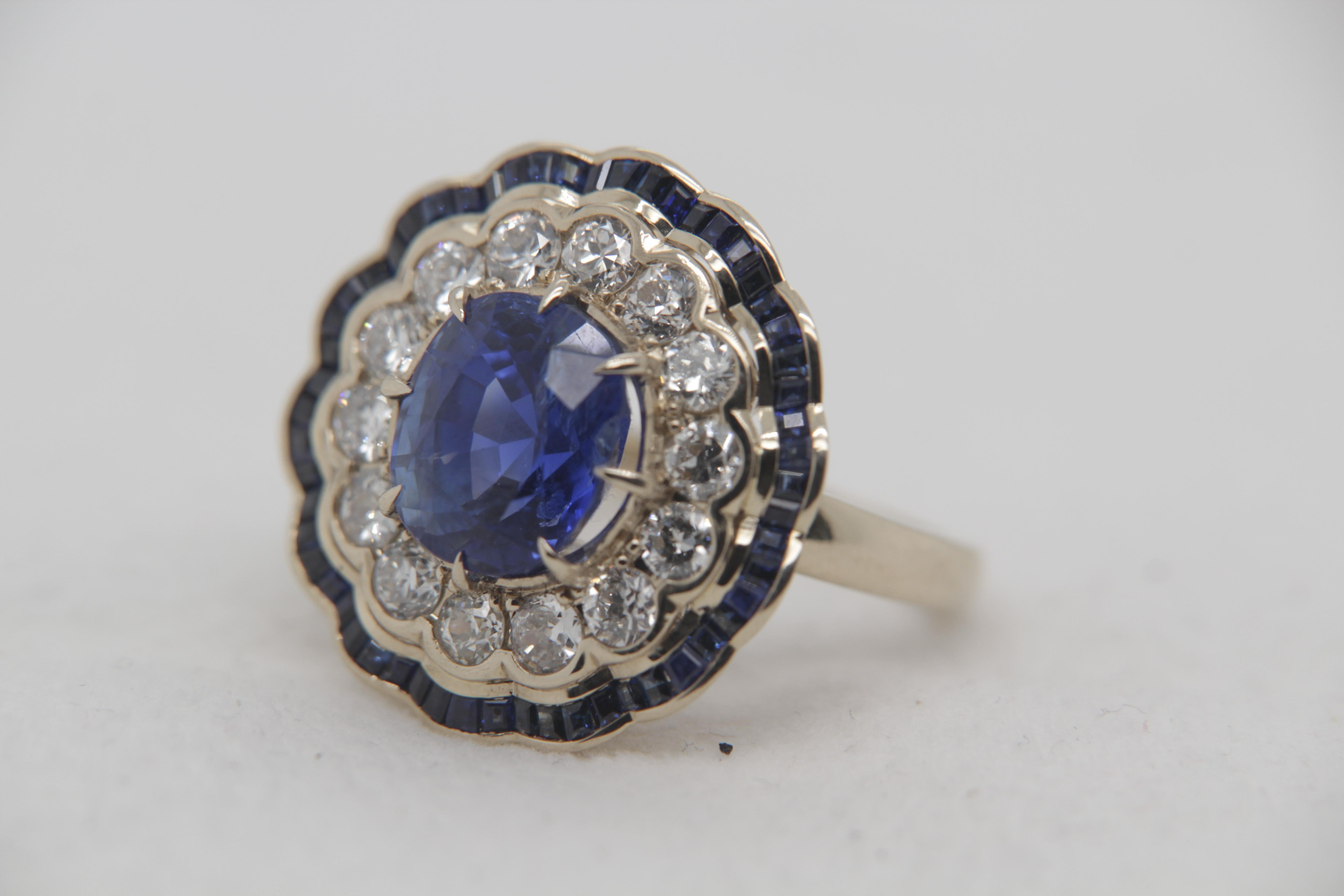 A brand new blue sapphire and diamond ring made in 18 Karat gold. The total diamond weight is 1.57 carat. The blue sapphire center piece weigh is 6.36 and small blue sapphire weigh is 1.19 carat. the whole weight of the ring is 11.65 grams. The ring