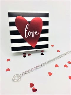 Pulsera línea tenis de plata de ley con circonita cúbica de 6,36 quilates y cierre corazón