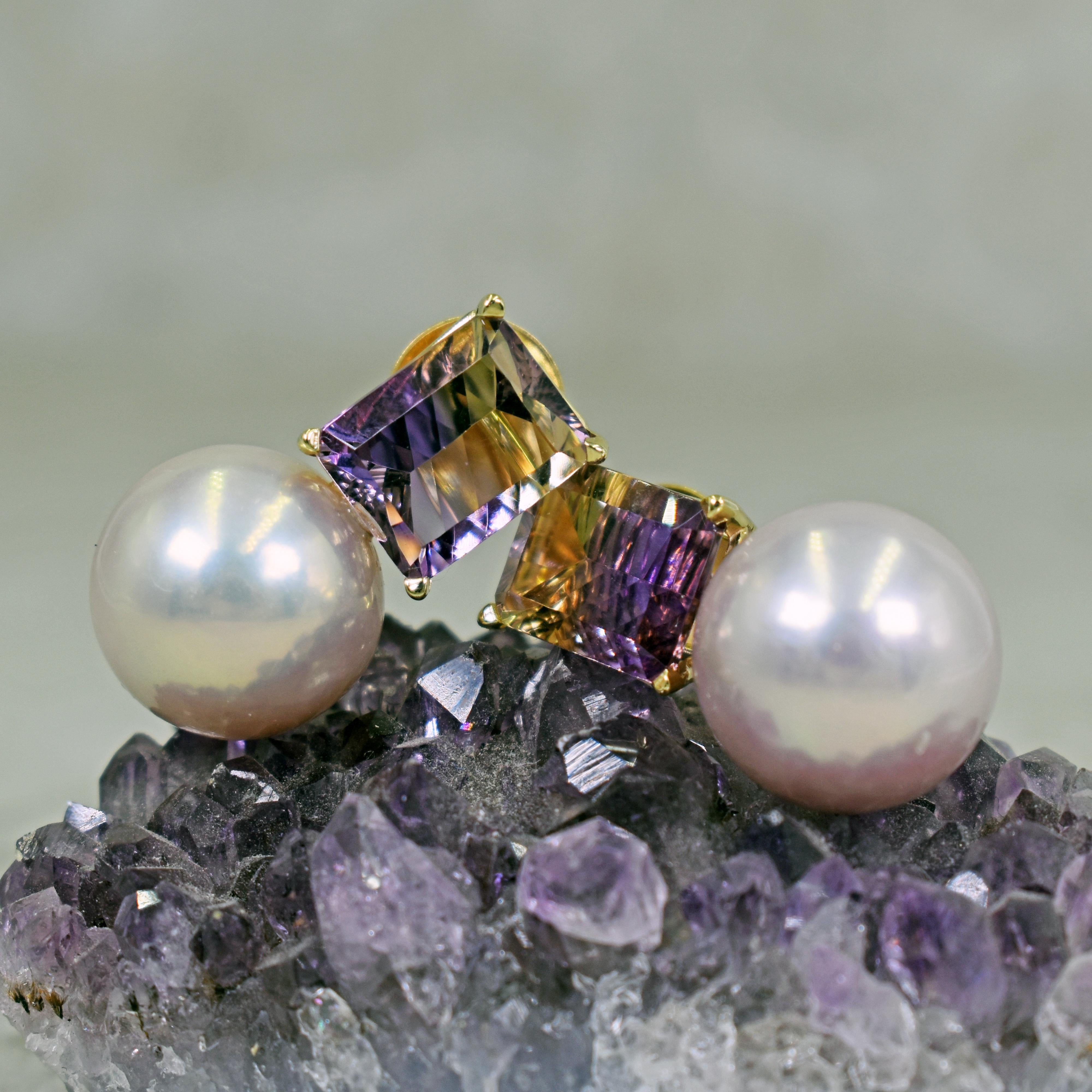 Beautiful, contemporary 14k yellow gold stud earrings featuring two fantasy, emerald cut Ametrine gemstones, totaling 6.36 carats, with 13.5mm pinkish purple Freshwater Pearl drops. Stud earrings are 0.94 inches or 24mm in length. Gorgeous and