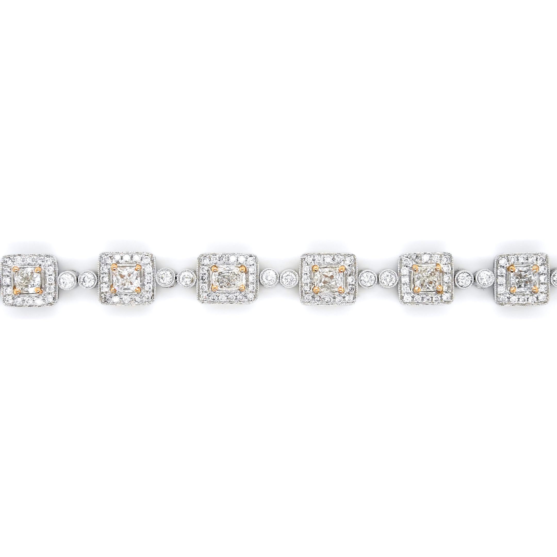 223 White Diamonds: 6.36 Carats
Metal: 18K White Gold, 20.50 Grams
