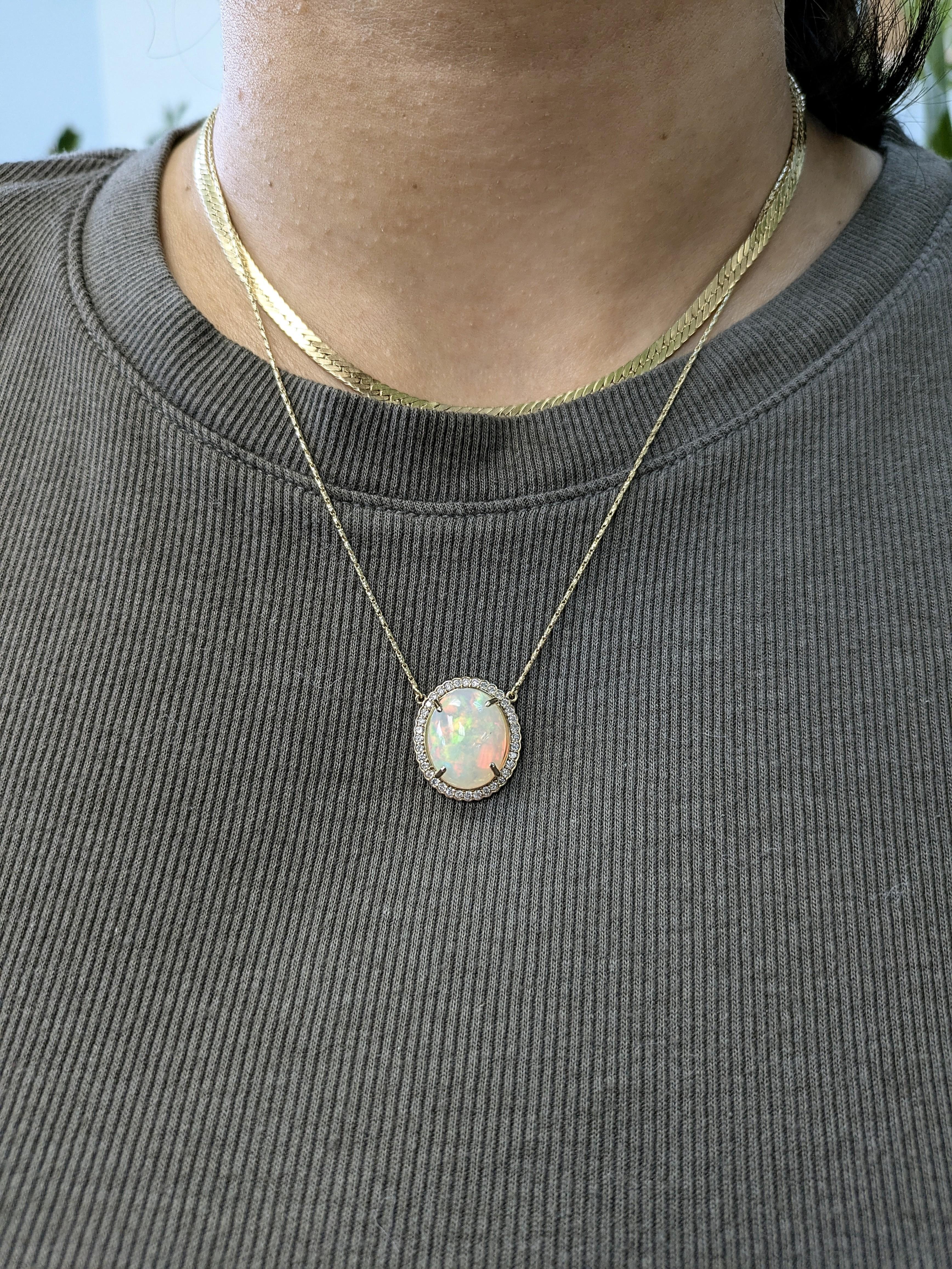 Art Deco 6.36cts Ethiopian Opal Pendant with Natural Diamonds Halo in 14K Solid Gold For Sale