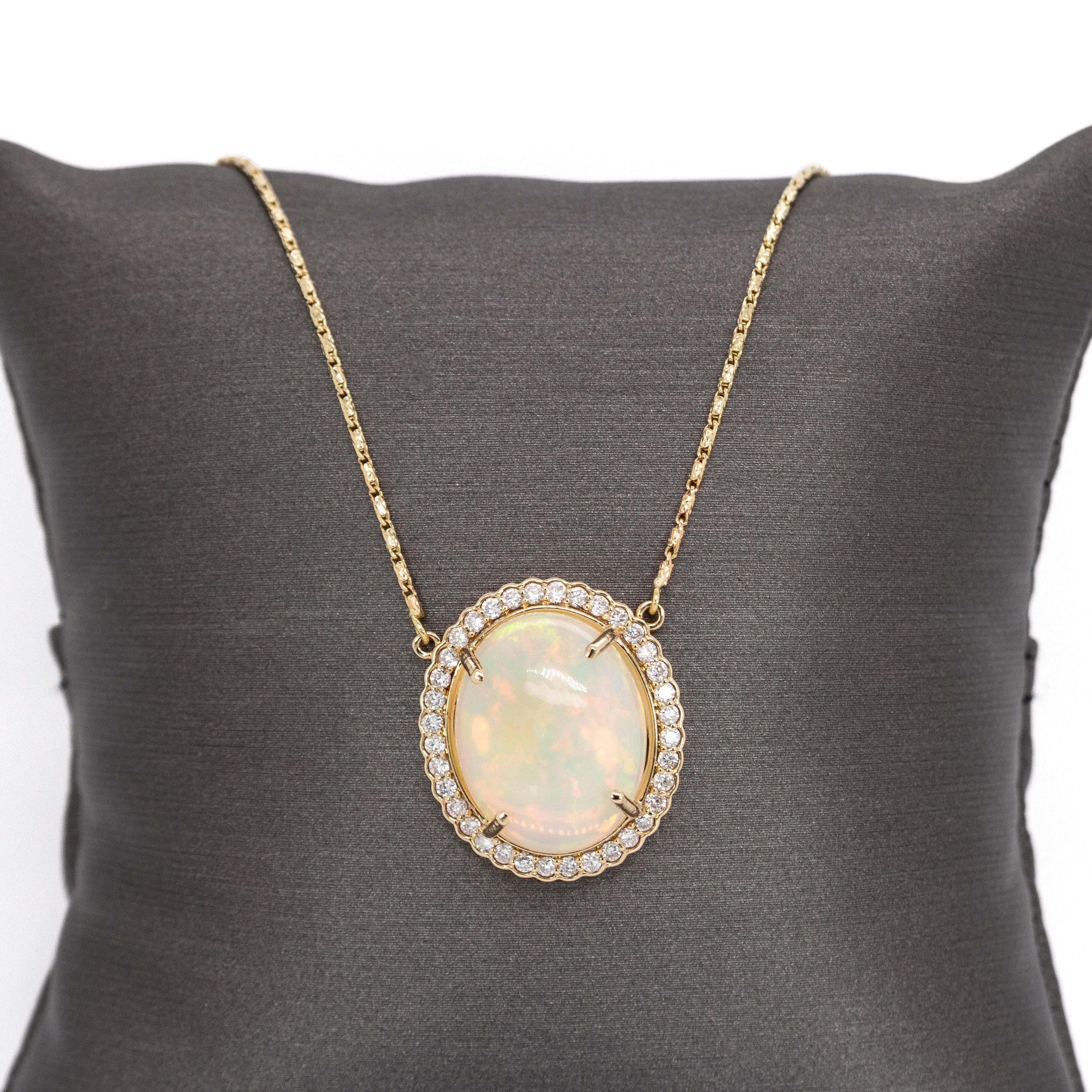 Oval Cut 6.36cts Ethiopian Opal Pendant with Natural Diamonds Halo in 14K Solid Gold For Sale