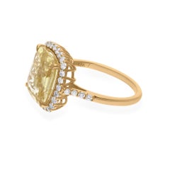 Anello con gemma di zaffiro giallo da 6,37 carati e diamante da 0,63 carati in oro giallo da 18 carati