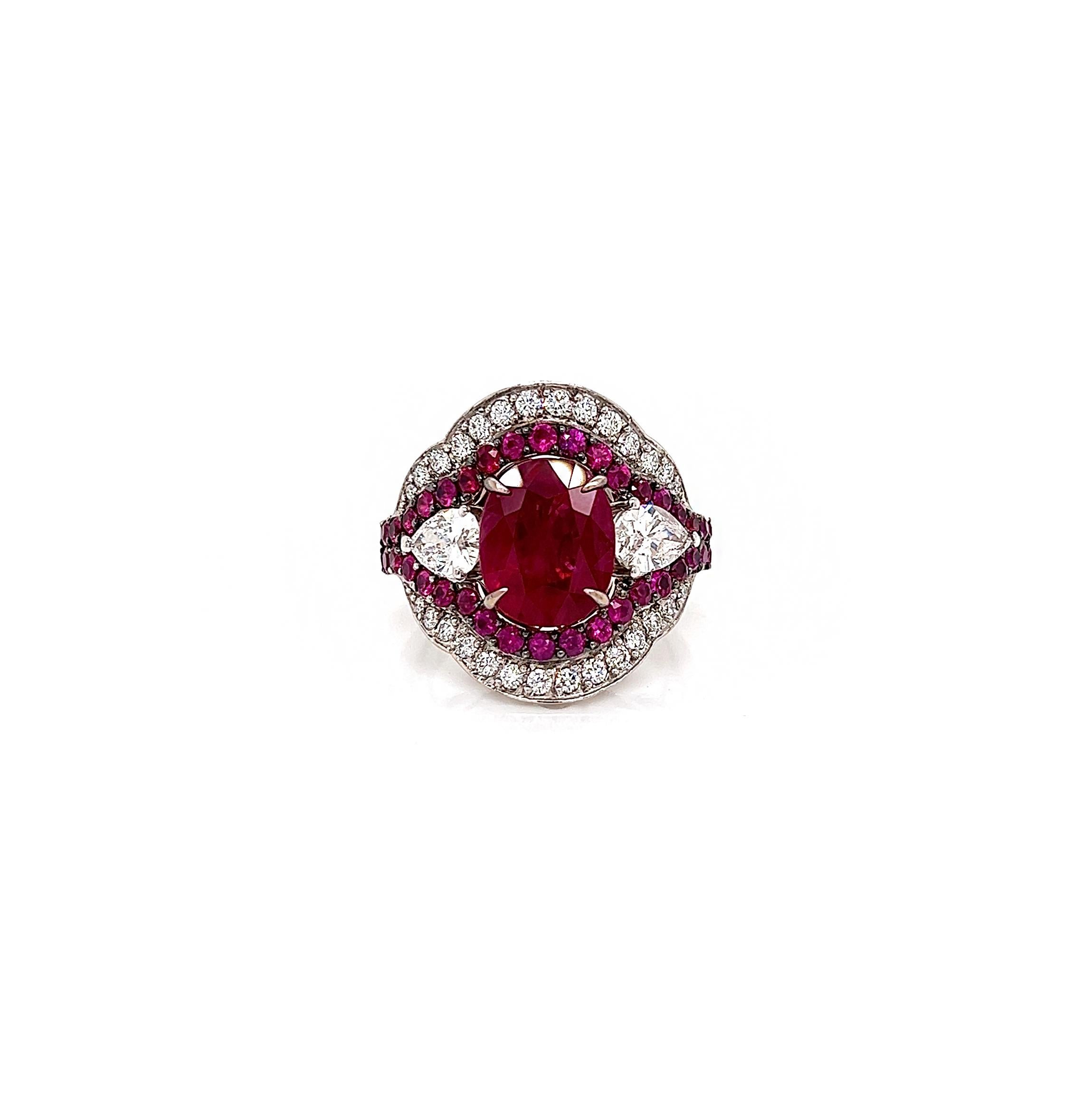 6.37 Total Carat Ruby and Diamond Ladies Ring. GIA Certified.

-Metal Type: 18K White Gold
-3.62 Carat Oval Cut Natural Ruby, GIA Certified 
-Ruby Measurements: 11.42 x 9.24 x 4.23 mm
-The color appearance of this stone is described as 