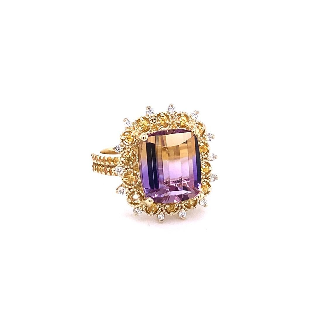 6.38 Carat Ametrine Yellow Sapphire and Diamond 14K Yellow Gold Cocktail Ring

This ring definitely has a WOW factor!  
Flashing a vivid color of yellow and purple the vibrant Emerald Cut Ametrine sits between Yellow Sapphires and Diamond accents. 