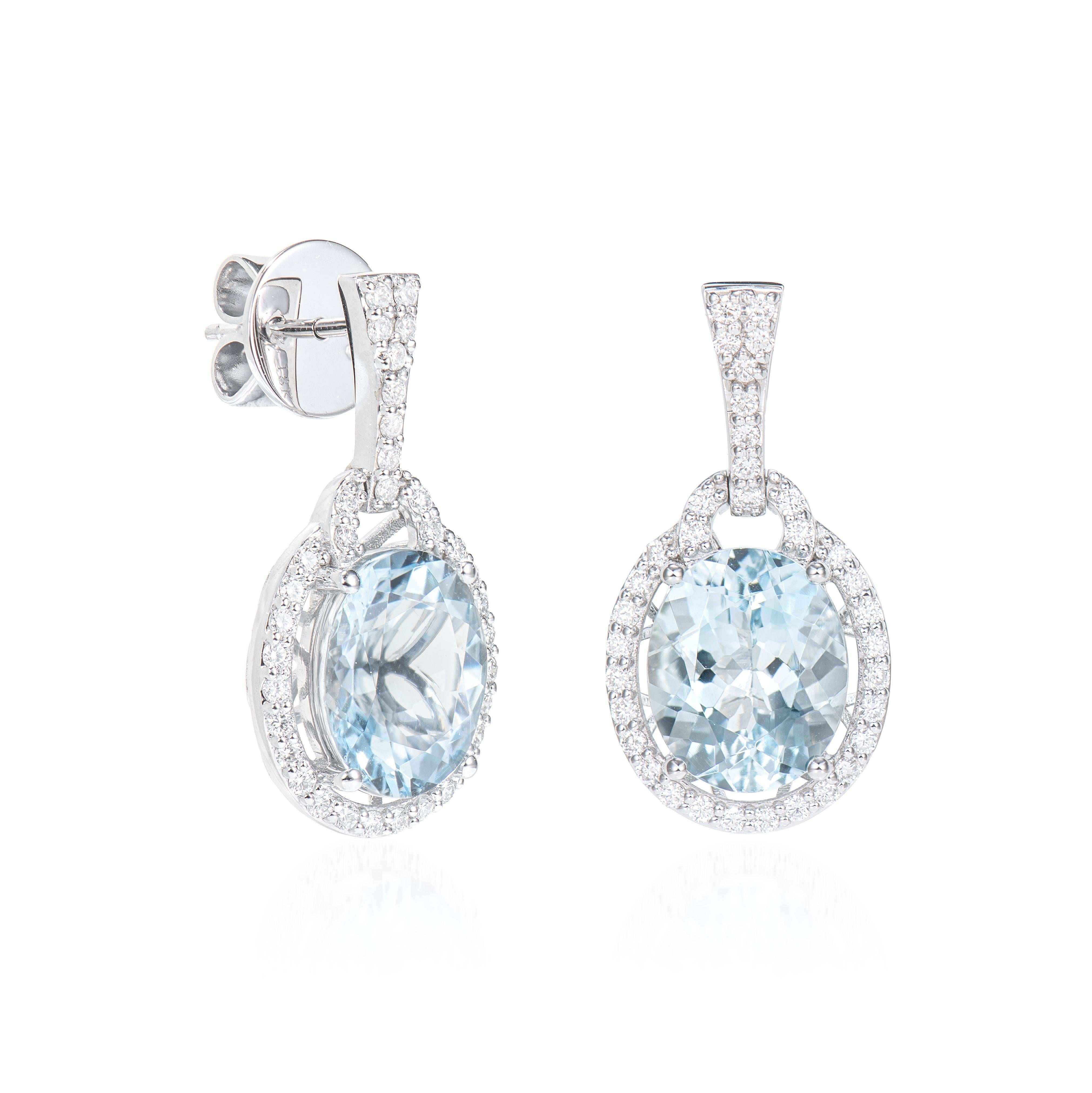 This collection features an array of aquamarines with an icy blue hue that is as cool as it gets! Accented with diamonds these Drop Earrings are made in white gold and present a classic yet elegant look. 

Aquamarine Drop Earrings in 18Karat White