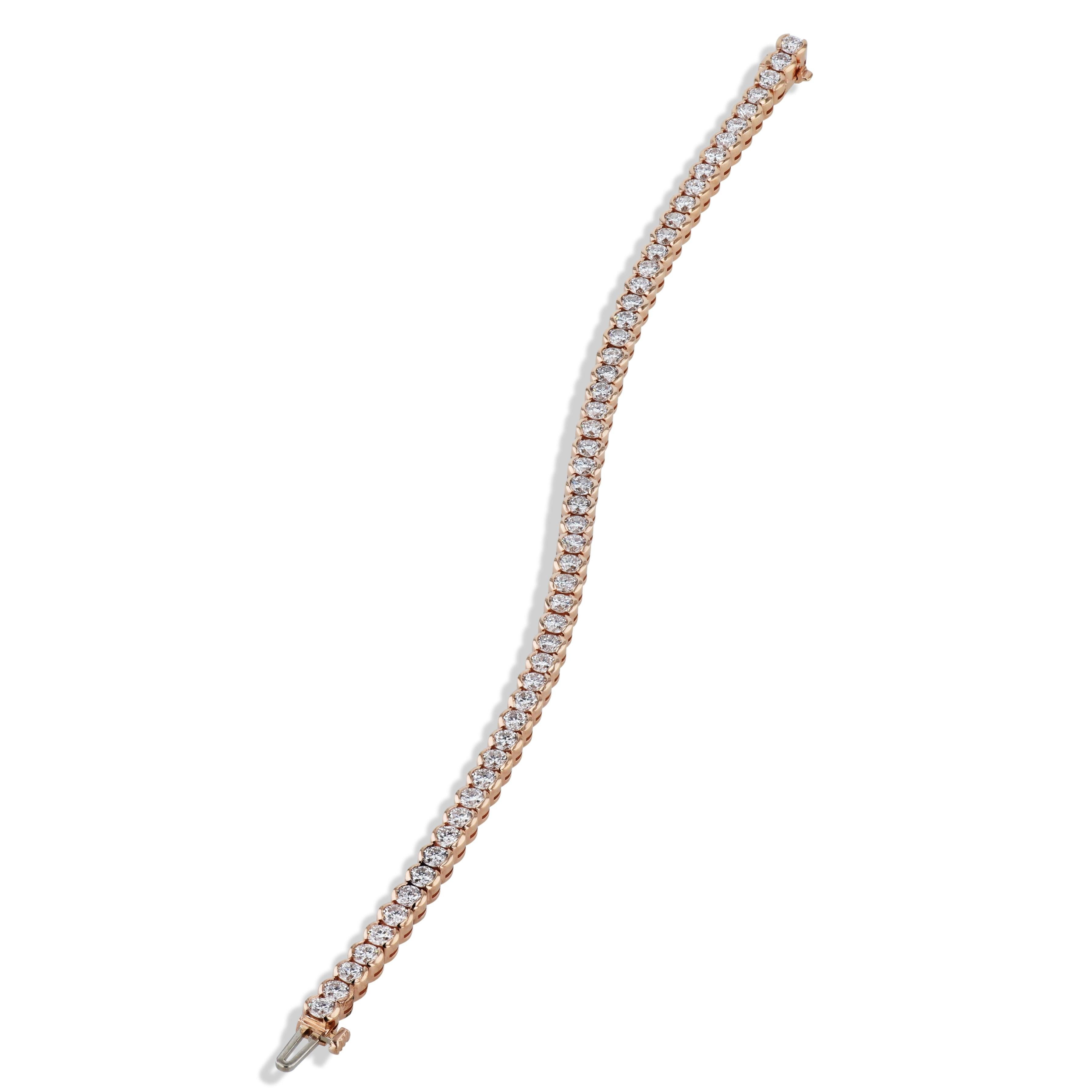 This exquisite 18kt. Rose Gold Diamond Tennis Bracelet captures elegance and style! 
Featuring 54 diamonds totaling 6.38 carats, these sparkling jewels are brilliantly semi-bezel set by hand. 
Diamond  Rose Gold Tennis Bracelet.

7 inches
18kt. Rose