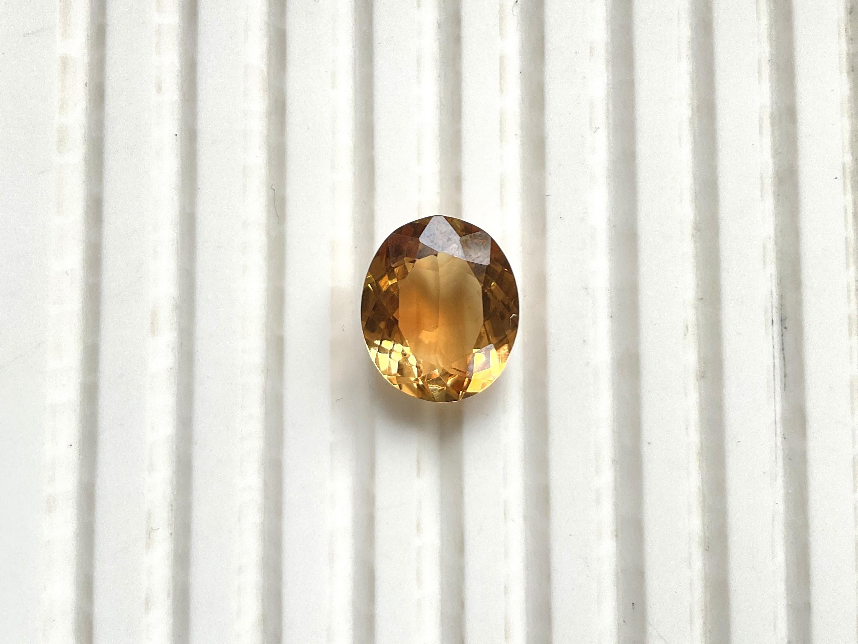 Taille ovale Tourmaline jaune orangé taille ovale facettée de 6,38 carats en vente