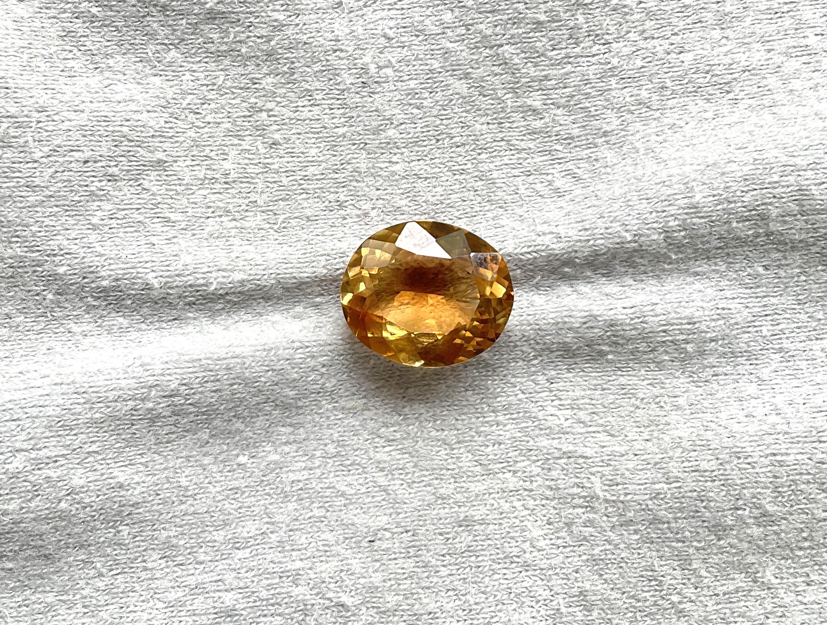 Tourmaline jaune orangé taille ovale facettée de 6,38 carats Unisexe en vente