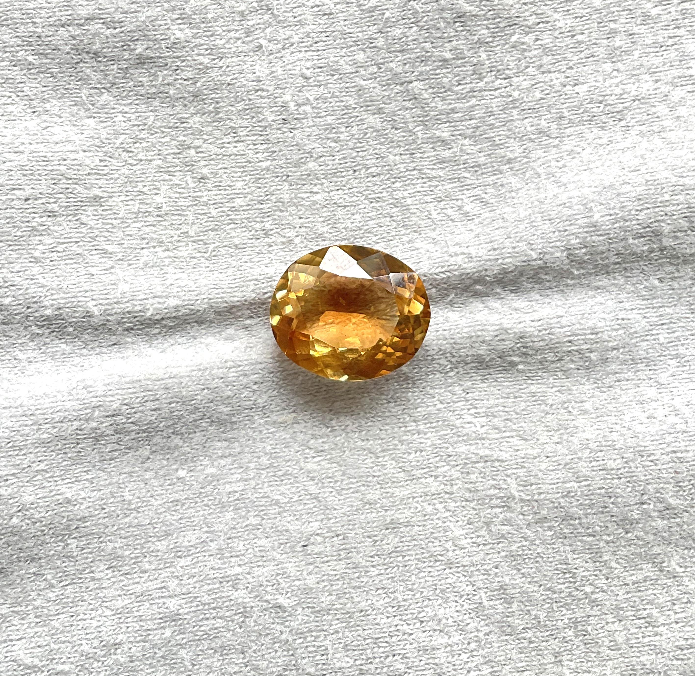 Tourmaline jaune orangé taille ovale facettée de 6,38 carats en vente 1