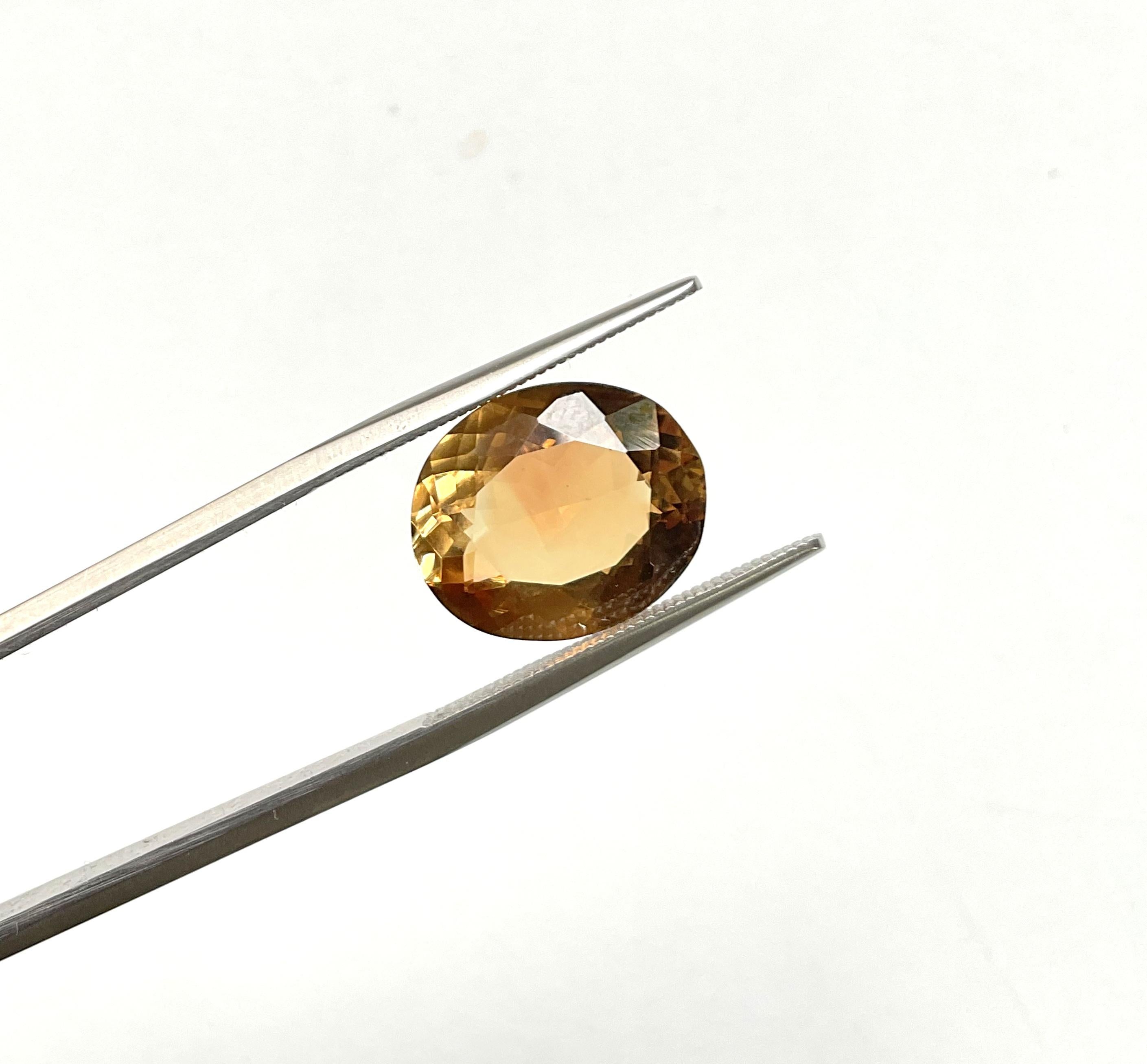 Tourmaline jaune orangé taille ovale facettée de 6,38 carats en vente 3