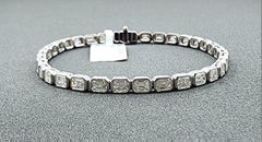 6.38 ct Smaragdschliff Ost-West Lünette Set Tennisarmband