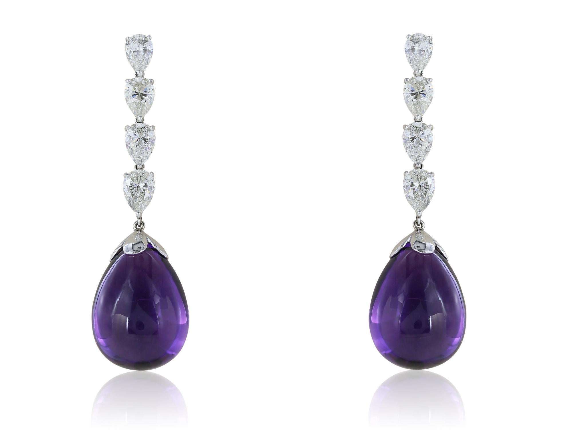 One of a kind platinum Amethyst and Diamond drop earrings, consisting of 2 pear shape briolette drops, with a total carat weight of 63.82 carats, dangling from 4 pear shape prong set diamonds on each earring, total of 8 diamonds, with a total carat