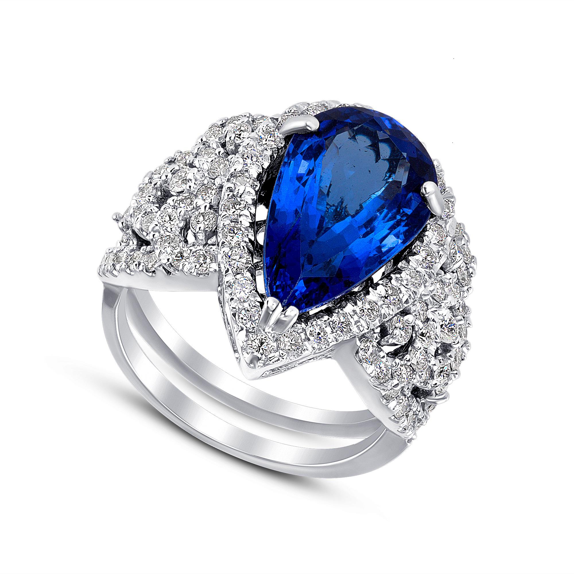 18K White Gold 18.8gm / Neon Blue Tanzanite 6.38ct / 1.36ct Diamond E-F Color VS Quality very well cut #GVR1681
Artistically crafted in 18K white gold with neon blue 6.38ct handsome tanzanite, the stone that unifies the energy of the mind and heart,