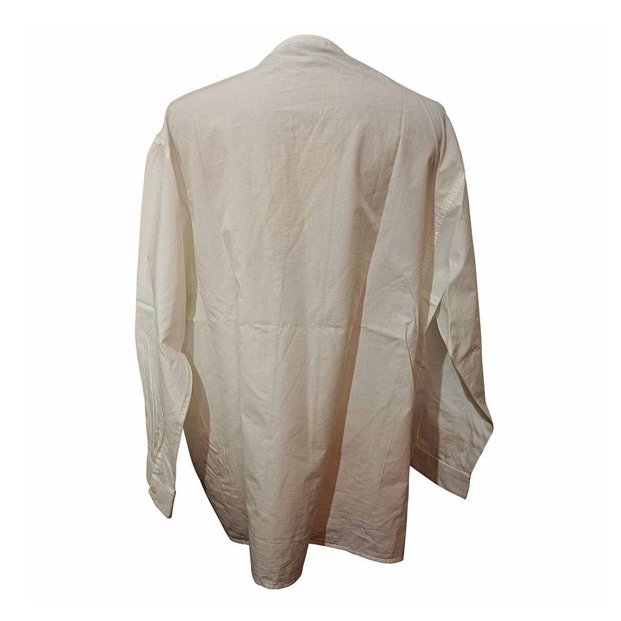 Cotton White color V Neck With pocket Shoulder/hem cm 62 (24,4 inches) Large fit shoulders Original price euro 250
