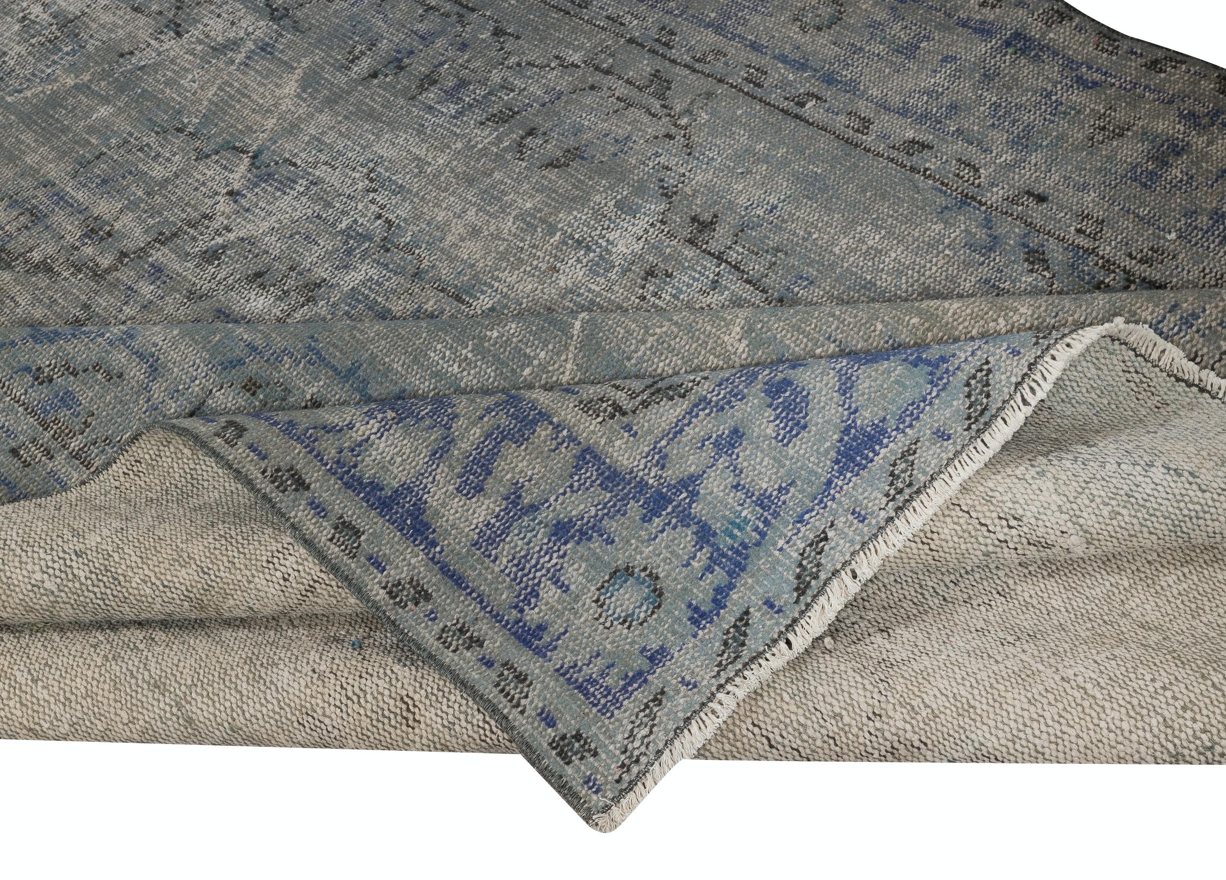 Moderne 6.3x10 Ft Vintage Turkish Area Rug redyed in Blue Color for modern interiors en vente