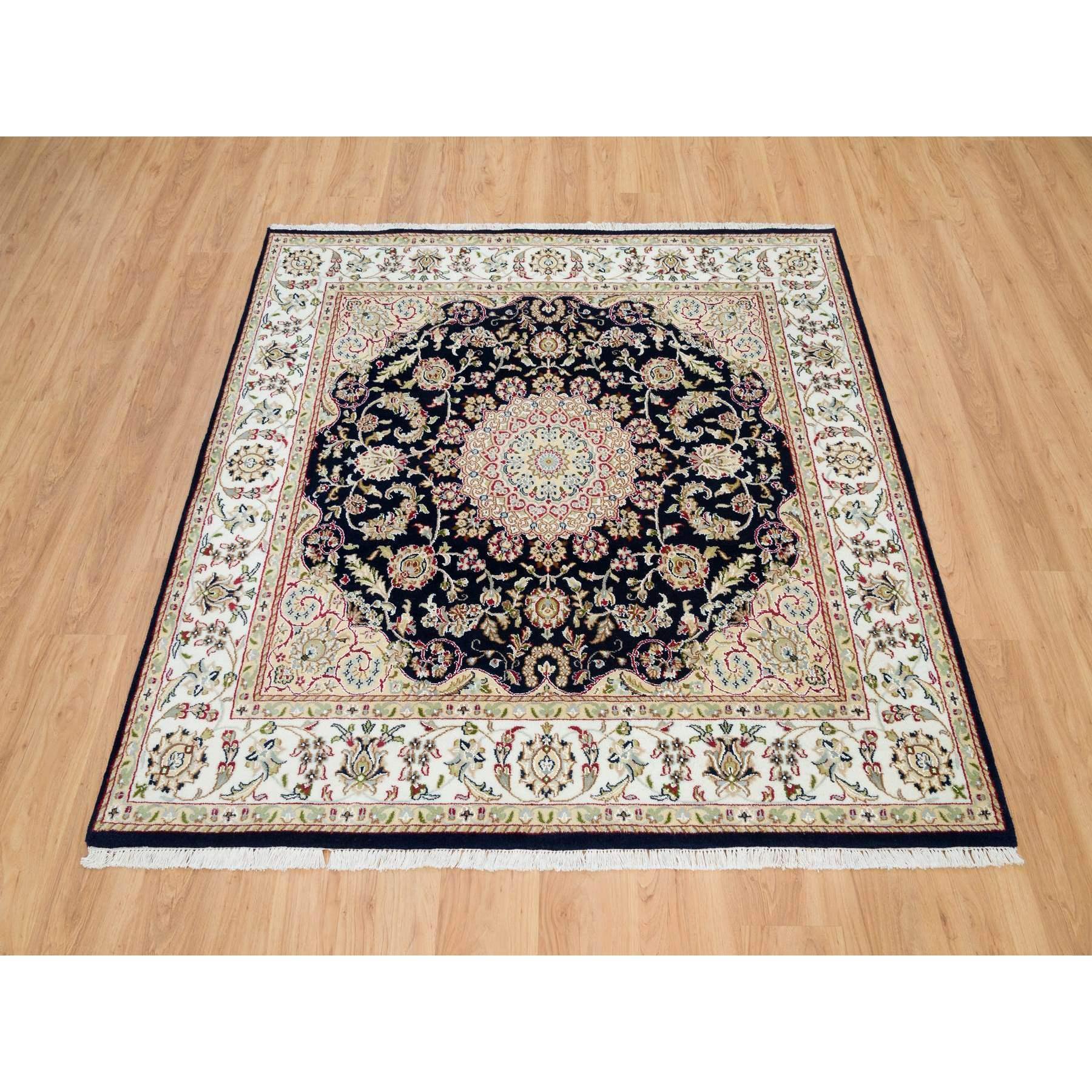 Midnight Blue, 250 KPSI, Natural Wool, Hand Knotted, Nain with Center Medallion Flower Design, Square Oriental Rug
Primary materials: Wool
Latex: No Pile 
height: 0.25 Inches
Style: Traditional
Primary color: Blue
Secondary colors: Red, Light Blue,