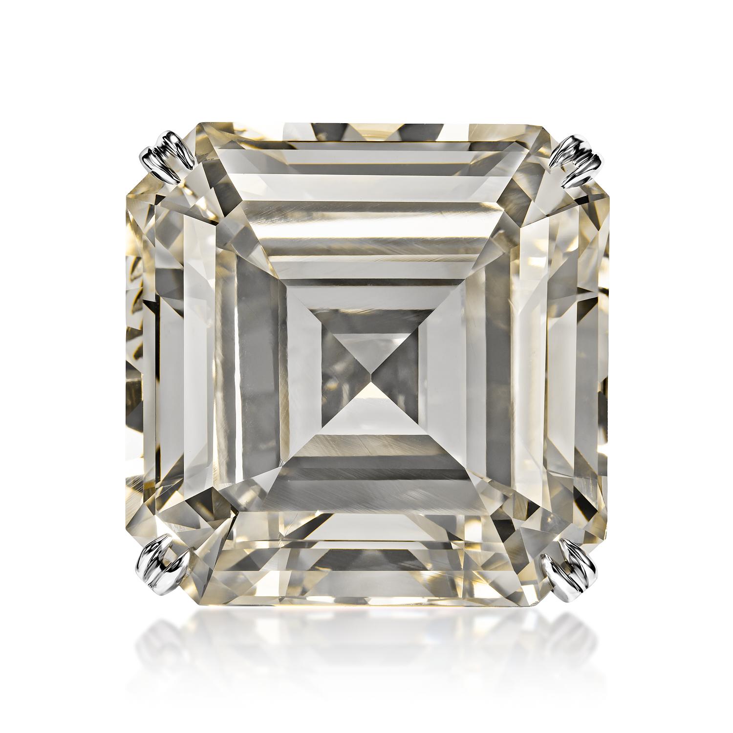 Treasure 64 Carat O-P SI1 Asscher Cut Diamond Solitaire Engagement Ring

GIA CERTIFIED
Center Diamond:

Carat Weight: 63.85 Carats
Color : O to P range
Clarity: SI1
Style: Asscher Cut
Approximate Measurements: 23.07 x 22.85 x 14.67