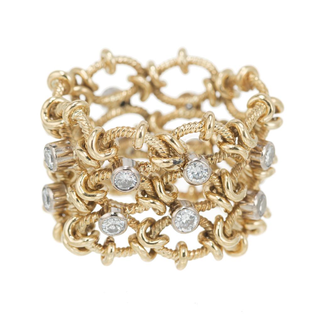 Vintage 1960's wide diamond fancy link ring. Masterly woven twisted 14k yellow gold links, connected by plain gold loops. 16 sparkling round brilliant cut diamonds set in 14k white gold bezels. Size 6 and not sizable. A beautiful example of