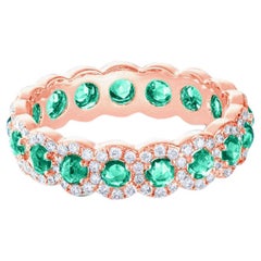 64 Facets 1.50 Carat Emerald and Diamond Ring in 18 Karat Rose Gold
