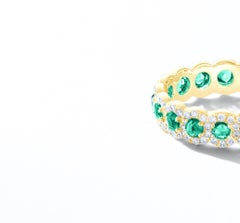 64 Facets 1.50 Carat Emerald and Diamond Ring in 18 Karat Yellow Gold