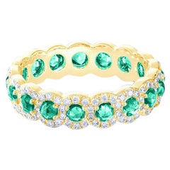 64 Facets 1.50 Carat Emerald and Diamond Ring in 18 Karat Yellow Gold