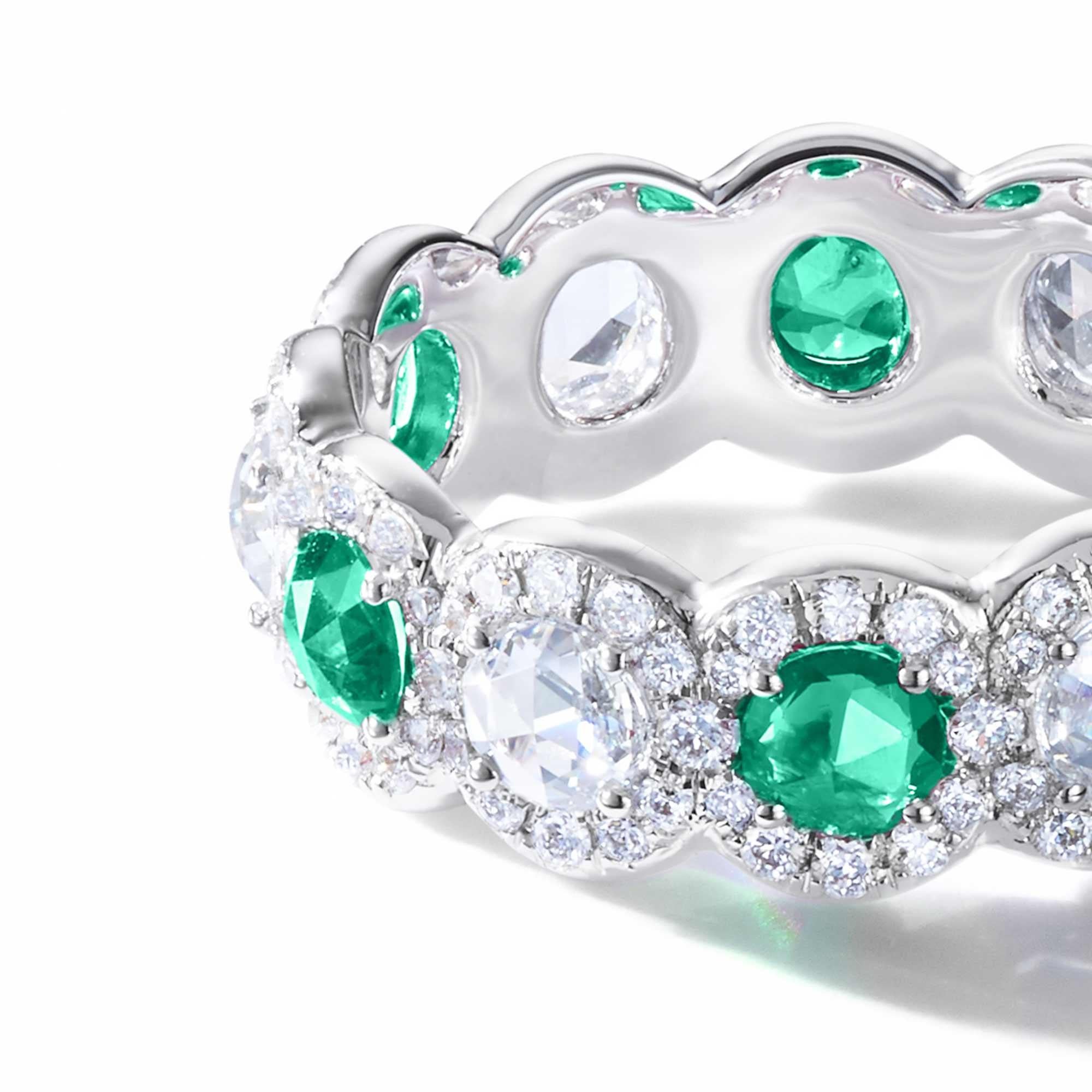 The Elements Ring embodies the light and delicate aesthetic that defines 64Facets’ designs. Our classic Scallop band is rendered even more spectacular with the addition of radiant rose-cut emeralds with alternating rose-cut diamonds and delicately