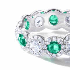 64 Facets 2 Carat Emerald and Diamond Ring in 18 Karat White Gold