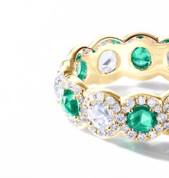 64 Facets 2 Carat Emerald and Diamond Ring in 18 Karat Yellow Gold