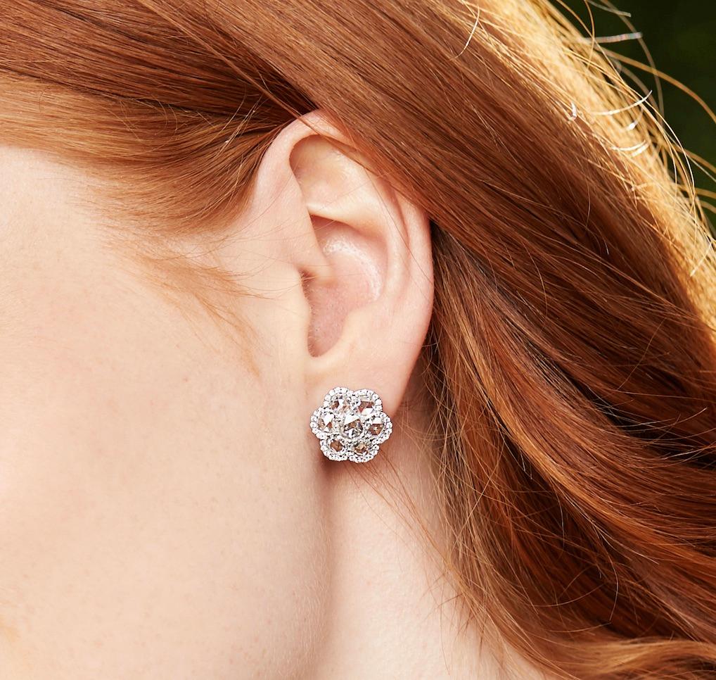 Beautifully feminine, our Floral Diamond Stud earrings bring floral inspiration to the everyday.

Seven round rose-cut diamonds are accented by round-brilliant cut diamonds to reflect a subtle floral silhouette. 

These 3.25 carat diamond studs