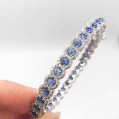 64 Facets 6.25 Carat Sapphire and 1.75 Carat Diamond Bangle in 18 Karat Gold