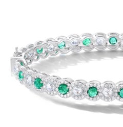 64 Facets Elements Emerald and Diamond Bangle in 18 Karat White Gold, 6.15 Carat