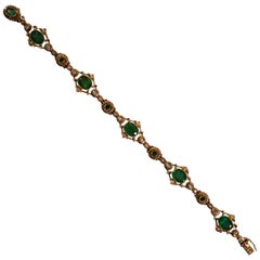 6.40 Carat Emerald 0.50 Carat White Diamond Yellow Gold Bracelet