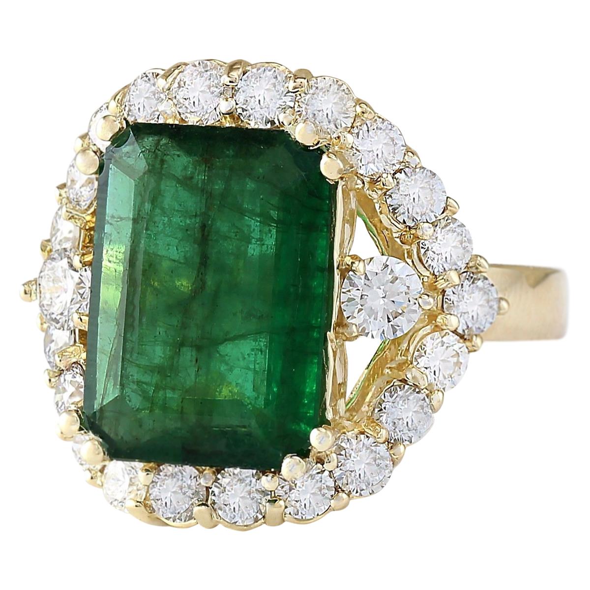 6.40 Carat Emerald 14 Karat Yellow Gold Diamond Ring
Stamped: 14K Yellow Gold
Total Ring Weight: 7.6 Grams
Total  Emerald Weight is 4.75 Carat (Measures: 14.00x10.00 mm)
Color: Green
Total  Diamond Weight is 1.65 Carat
Color: F-G, Clarity:
