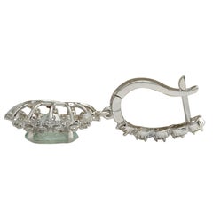 Orecchini con diamante e acquamarina in oro bianco 14 carati