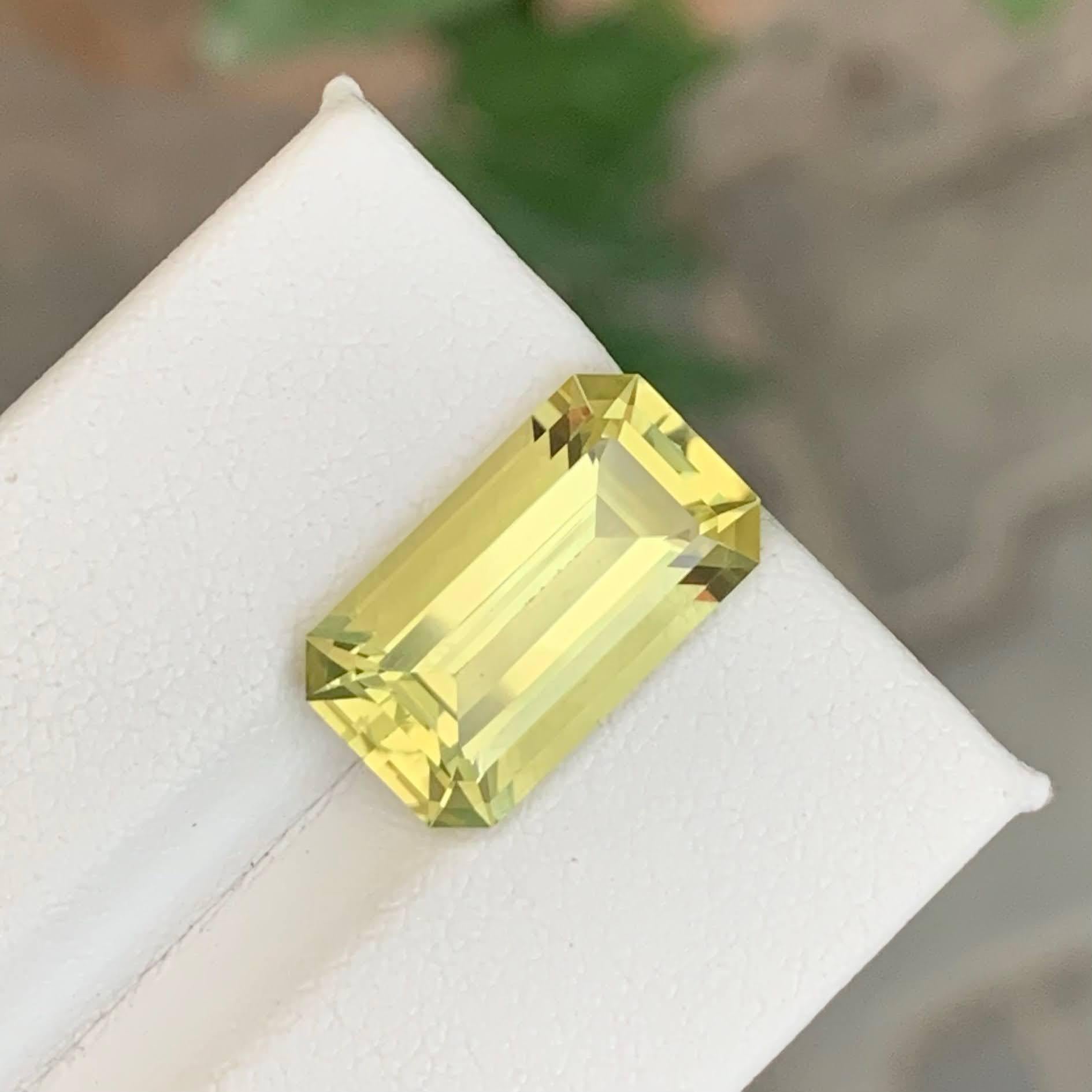 Women's or Men's 6.40 Carat Natural Loose Lemon Quartz Stone Emerald Cut African Gemstone For Sale