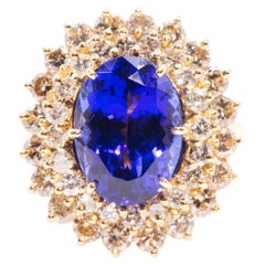 6.40 Carat Oval Tanzanite and 2.20 Carat Diamond 18 Carat Gold Cocktail Ring