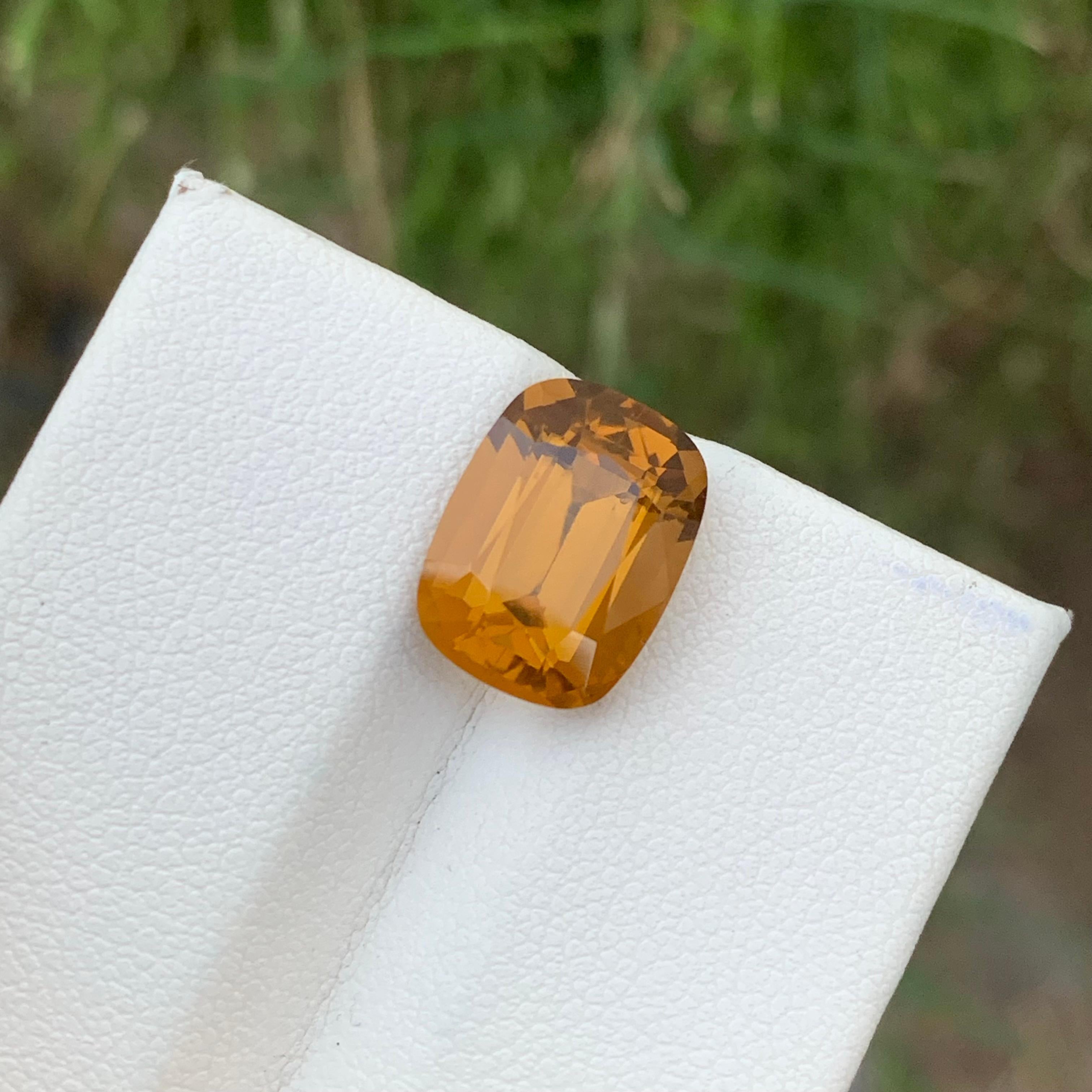 Loose Citrine
Weight: 6.40 Carats 
Dimension: 13.1x9.8x7.9 Mm
Origin: Brazil
Shape: Cushion
Color: Yellow
Treatment: Non
Citrine is a radiant and captivating gemstone known for its warm, golden hues and the sense of joy it exudes. This variety of
