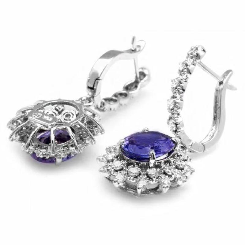 6.40Ct Natural Tanzanite and Diamond 14K Solid White Gold Earrings

Total Natural Oval Tanzanite Weight: 4.90 Carats

Tanzanite Measures: 10.00 x 8.00mm

Total Natural Round Cut White Diamonds Weight: Approx. 1.50 Carats (color G-H / Clarity