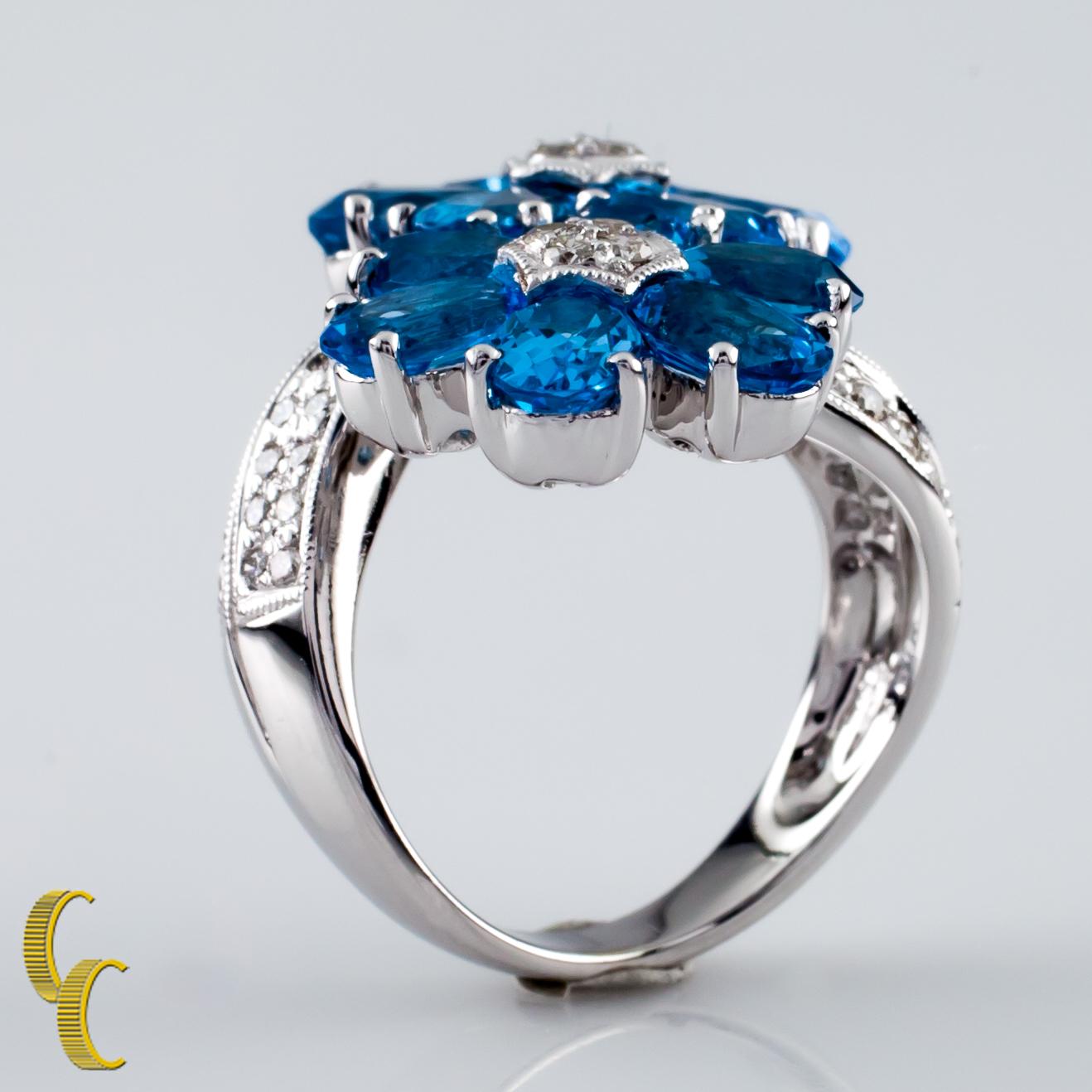Modern 6.42 Carat Blue Topaz Flower Ring with Diamond Accents in White Gold For Sale