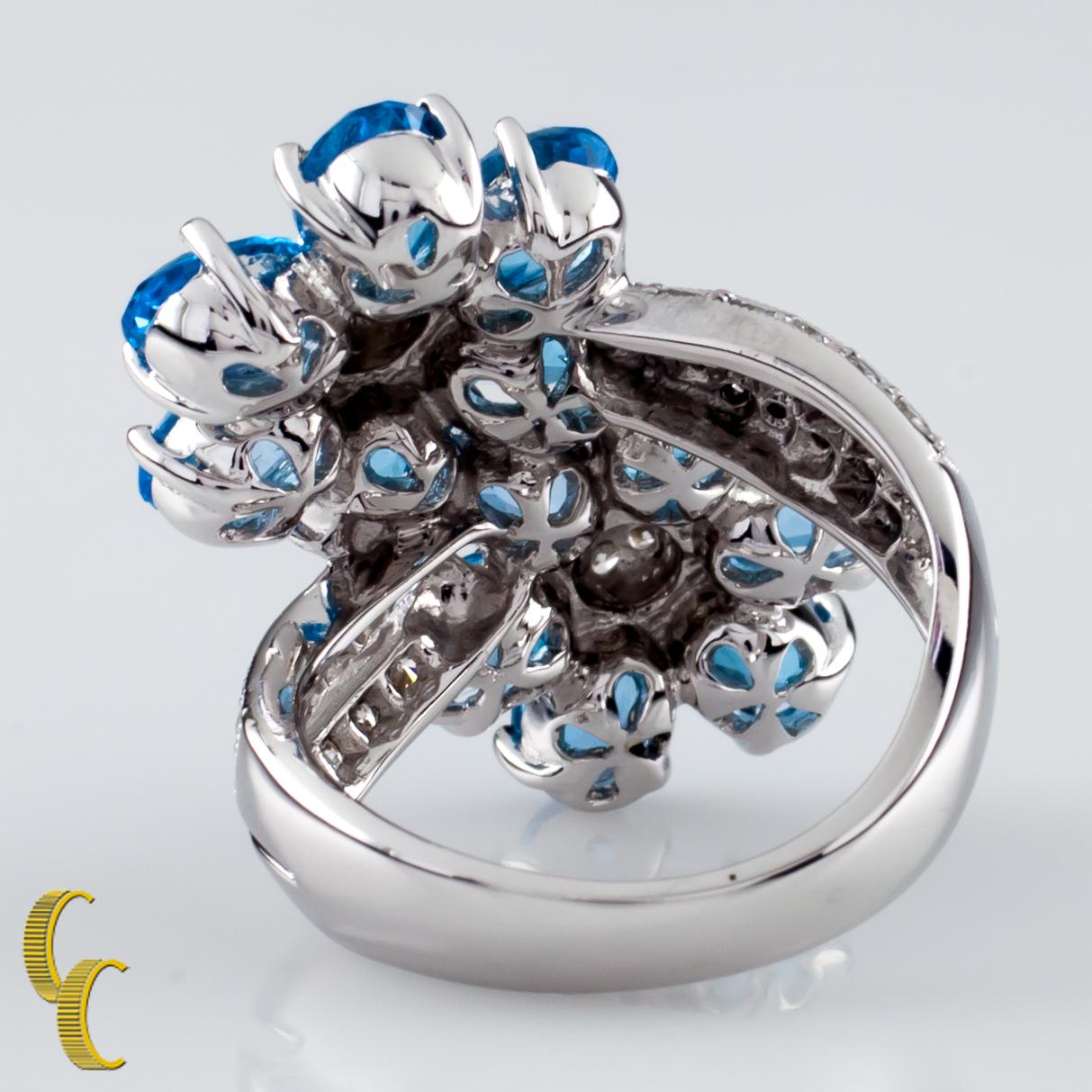 Women's 6.42 Carat Blue Topaz Flower Ring with Diamond Accents in White Gold For Sale