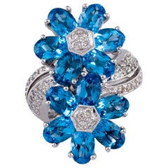 6.42 Carat Blue Topaz Flower Ring with Diamond Accents in White Gold